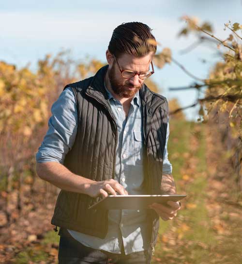 Ithaca winemaker with glasses